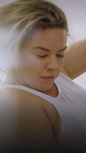 Une personne qui fait du « pole dance »